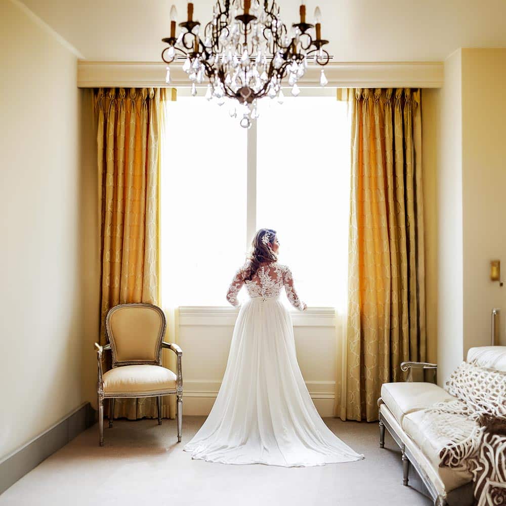instagram-full-figure-bride-staring-out-window-high-end