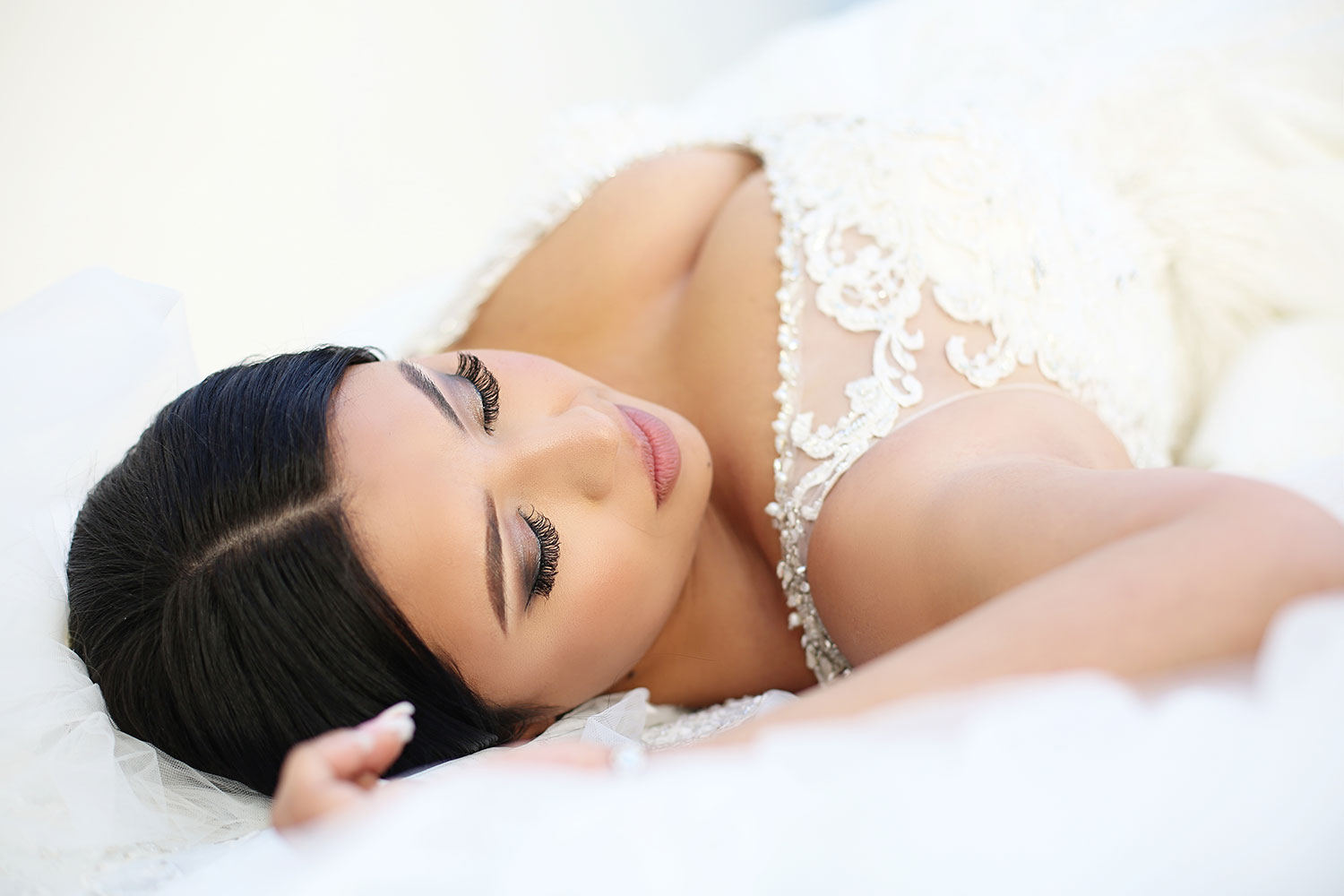 full-figured-bride-layng-down-shooting-from-above