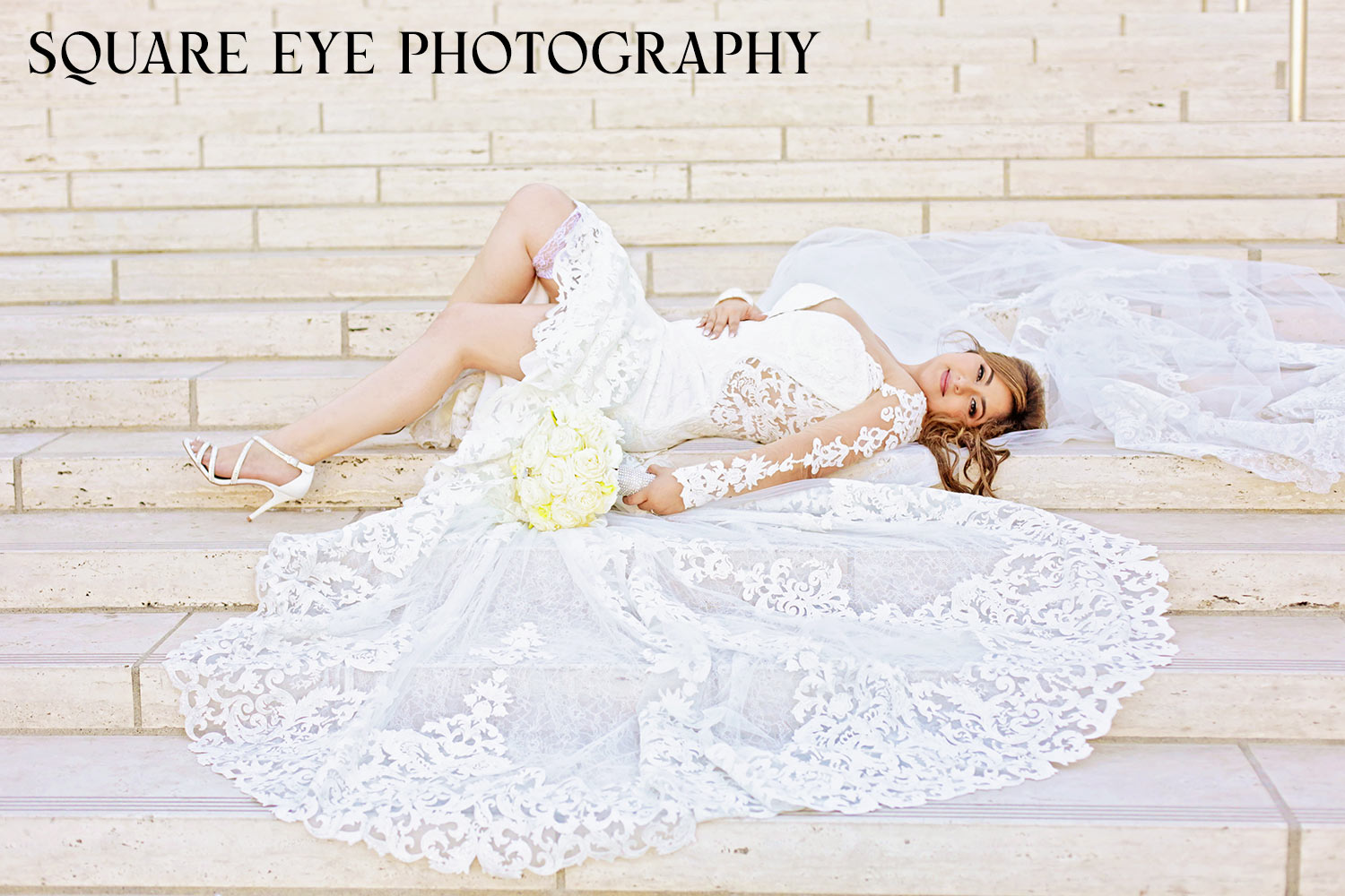 Bride-laying-down-on-stairs-on-her-cathedral-veil Bride-laying-down-on-stairs-on-her-cathedral-veil