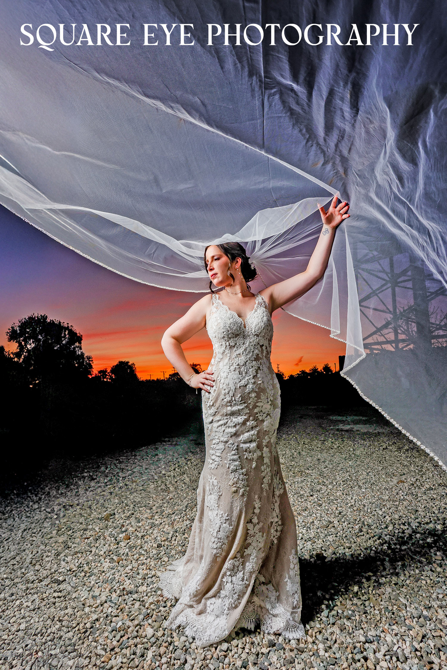 cathedral-veil-sunset-wedding-photos-05 Cathedral veil wedding photos of a bride with her long veil lifted against the sunset, photographed by Square Eye Photography